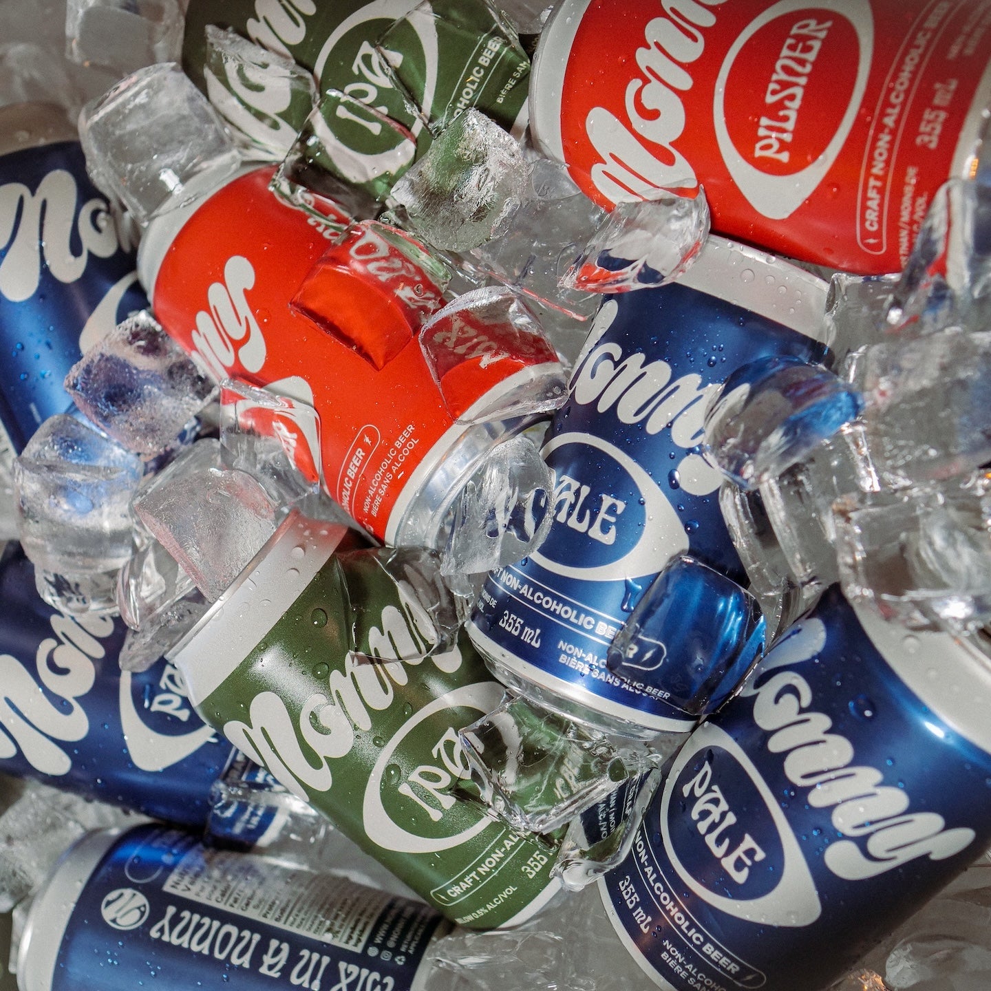 Photo of Non-alcoholic Nonny IPA, Pilsner, and Pale in a icy cooler.